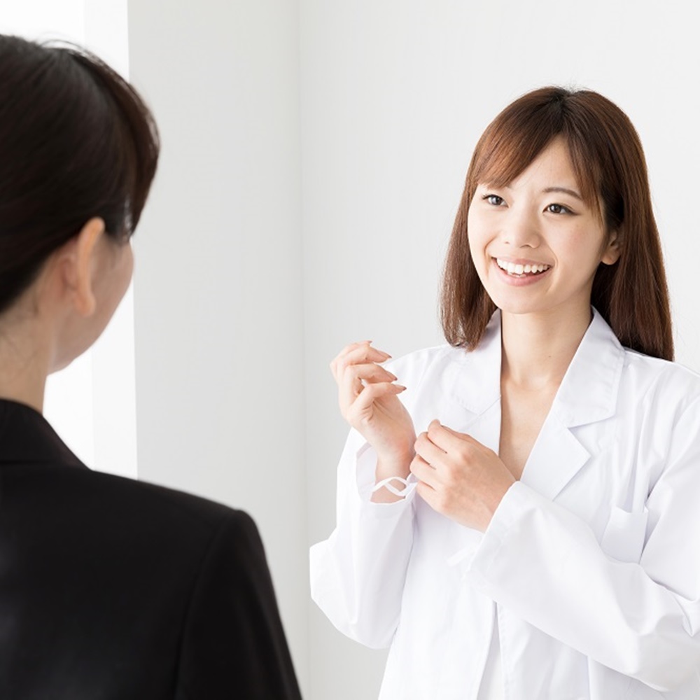 Portrait,Of,Asian,Woman,Wearing,White,Coat